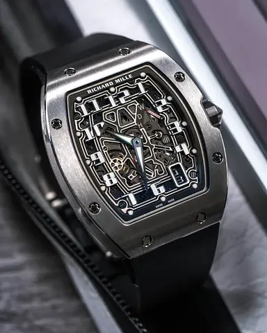 Richard Mille RM 67-01 extra-flat watch featuring a slim titanium tonneau case and a skeletonized di