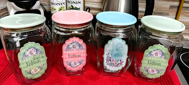 Set of 4 Glass Kitchen Storage Jars with Pastel Lids