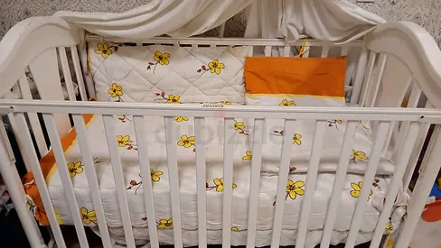 Dhs 50=- ( Reasonable Price Rare Used Price of new Dhs 339/= ) Junior's Baby Cot in Good Condition -