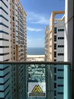 The most beautiful apartments in Ajman Towers, two bedrooms and a living room, sea view, at the best