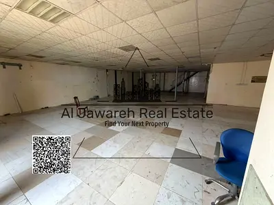 Warehouse with a mezzanine for rent in Ajman Industrial Area.