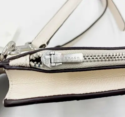 Coach small leather wristlet / card holder in cream