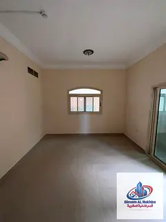 Spacious 2-bedroom apartment with a living room and balcony in a prime Al Majaz location. Features i
