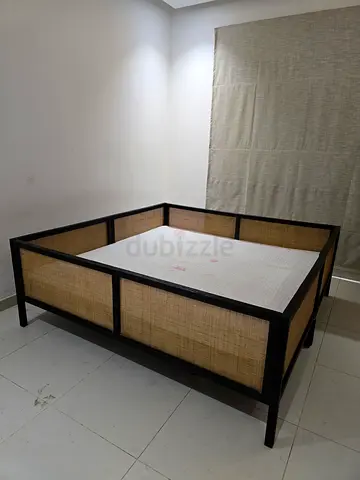 Crate and Barrel Solid wood framed bed with woven rattan panels - queen size 200x200cm