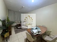Spacious, furnished 2-bedroom apartment with a living room available for annual rent in Ajman One To