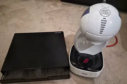 Coffee maker + capsules organizer