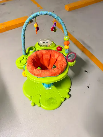 Green baby jumper seat/exersaucer with toys - good condition