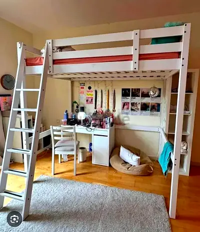 White wooden loft bed with built-in desk and ladder - good condition