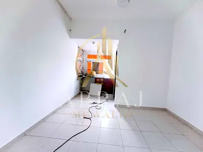 Very spacious studio with separate kitchen in affordable rent. In Muwaileh. Near road