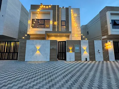 Villa for rent in Al Helio 2, Ajman | 4 master bedrooms, majlis, living room, roof terrace, and maid's room.