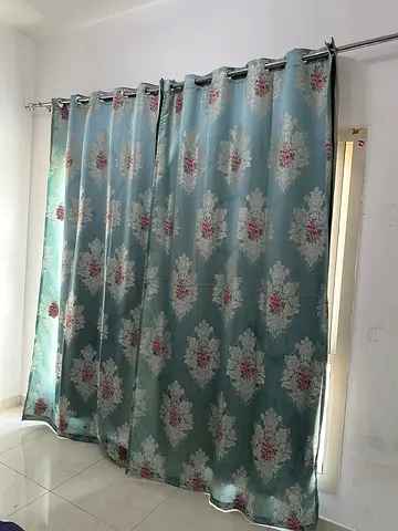 Pair of teal floral blackout curtains with grommets - good condition