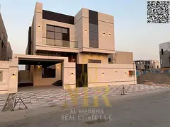 **Luxury Villa with Modern Design and High-End Finishes for Sale in a Prime Al Bahia Location** **An