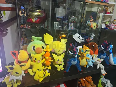 Lot of Pokémon plush toys — mixed sizes, good condition