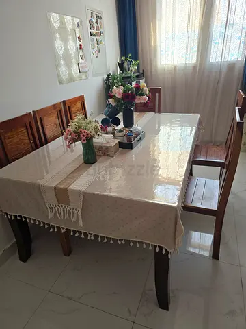 Wooden dining table with protective cover - good condition