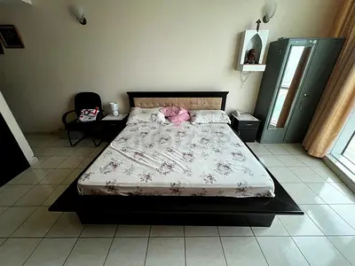 King size wooden platform bed with headboard and 4 drawers and mattress and bed side table