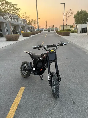 Kugoo wish o1 black moto cutz and baja light and very strong brakes and back fender and odi grips