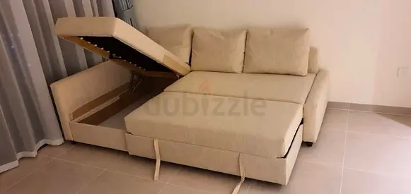 Cream L-Shaped Sofa Bed with Built-in Storage