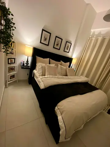 King Size bed frame with Headboard - Perfect Condition. For Mattress 180x200. Storage underneath