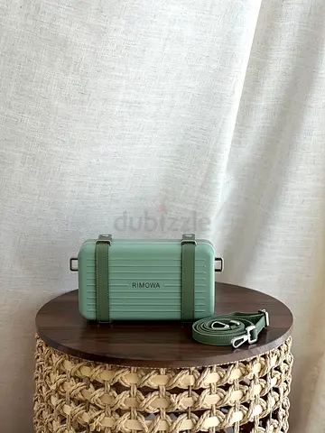 RIMOWA DIOR PERSONAL CLUTCH BAGS