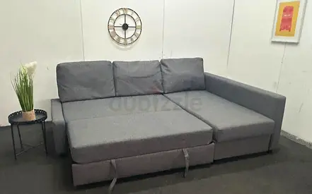 Grey L-Shaped Sofa Bed with Pull Out Section