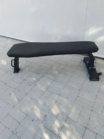 Flat workout bench — sturdy used gym bench, good condition