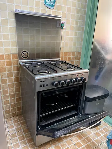 Used freestanding gas cooker with oven - stainless steel, good working condition