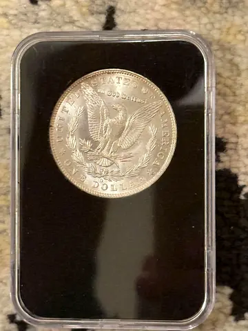 US Morgan Silver Dollar (1904 o) in plastic display holder