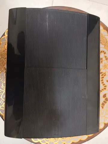 Sony PlayStation 3 Slim - Good Working Condition with 5 cds games working well plus controller
