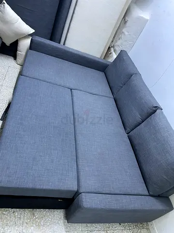 Grey L-Shaped Sofa Bed with Pull-out Extension
