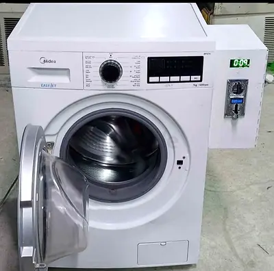 Coin operated washing machine system available for labour camp residential buildings and villas