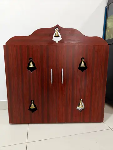 Wooden Wall Cabinet with Decorative Bells - Compact Storage Unit