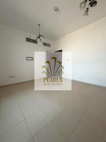 Elegant 2-Bedroom Apartment with Hall for Annual Rent in City Tower, Al Nuaimiya 2 Ajman, 2 Bathrooms, 2 Balconies, Closed Kitchen, Central AC, Free P