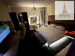 For rent: Furnished studio with hotel-style furniture, a balcony, swimming pool, gym, and private pa