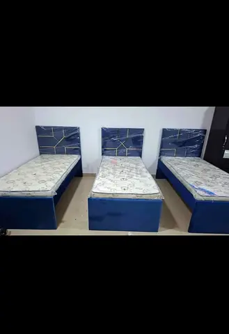 Three Single Beds with Headboards and Mattresses - Blue Velvet