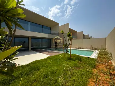 Villa for sale in Al-Zoura area, on the sea, surrounded by stunning natural scenery. Custom finishing and elegant, modern design.