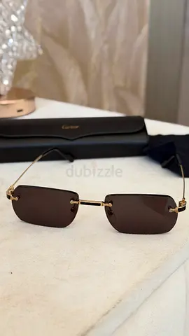 Cartier rimless rectangular sunglasses - gold frame, dark lenses