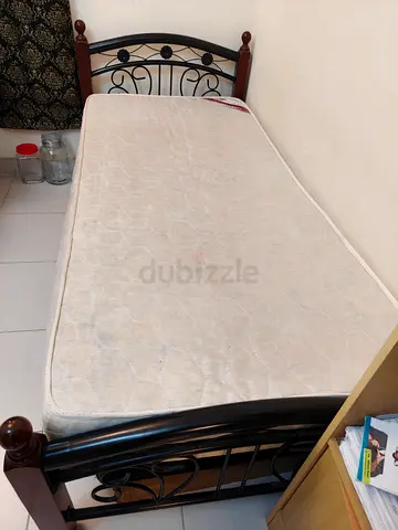 Single metal and wood frame bed with mattress - good condition