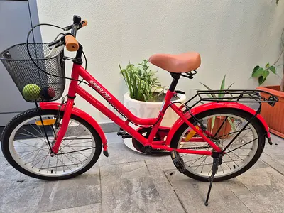 Kids Red city/commuter bicycle with basket and rear rack