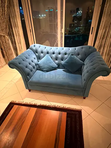 Blue tufted 3-seater sofa + 2 seaters sofa in good condition