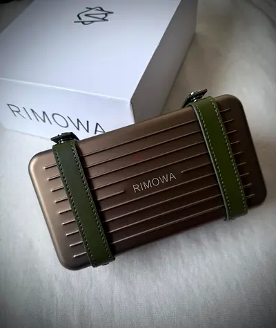 Rimowa crossbody Titanium color...