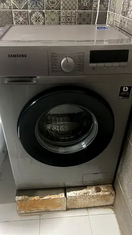 Samsung Front Load Washing Machine - 7kg, Silver, spider broken selling it for scrap