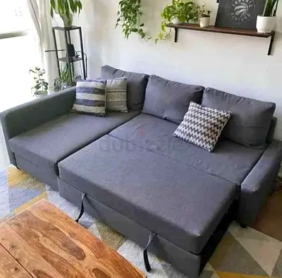 Grey L-shaped pull out sofa bed
