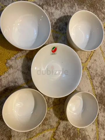 Set of 5 white ceramic serving bowls — good new condition