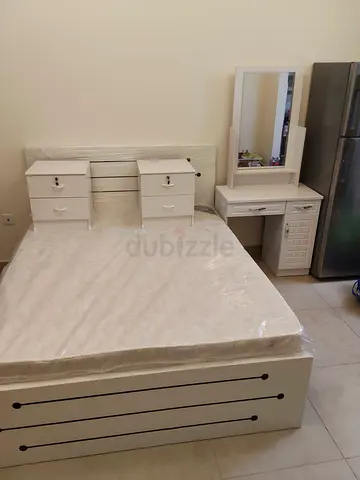 White double bed with mattress, 2 bedside cabinets and dressing table — good condition