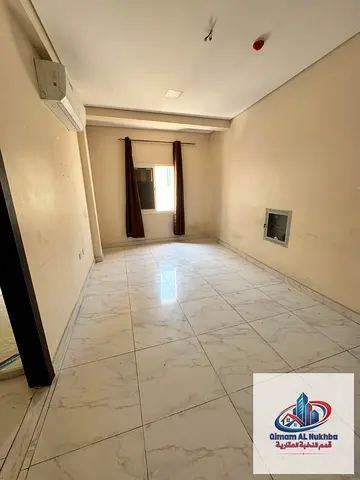 Lowest price for a 2-bedroom apartment with a living room and balcony; payment via cheque, one month free, and free parking included.