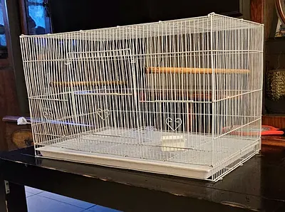 White bird cage with perches and removable tray and bowls - good condition