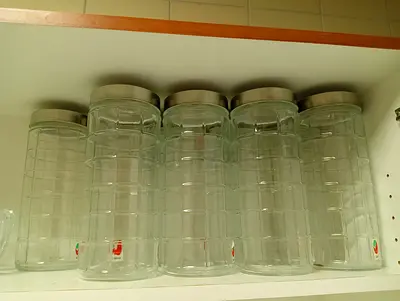 Set of 9 Glass Kitchen Storage Jars with Metal Lids