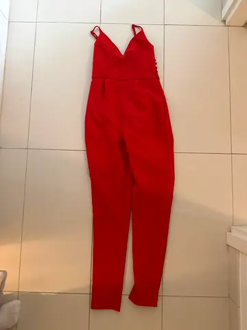 Red fitted women's jumpsuit with pockets