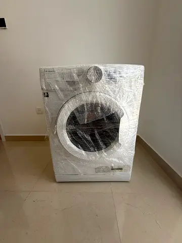 Front-load washing machine (wrapped) - good condition