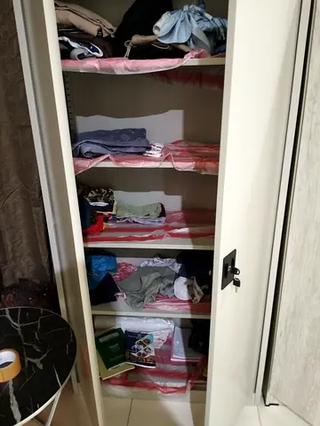 Single-door metal wardrobe / storage cabinet - good condition